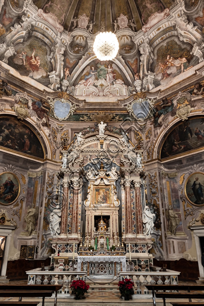 Interior view of the Church of Santa Maria della Carità in Brescia, showcasing the Baroque major altar and octagonal layout
