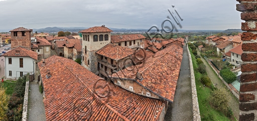 Panoramic view of the historic hamlet and the southern defensive walls of the Candelo Ricetto, a medieval fortified structure