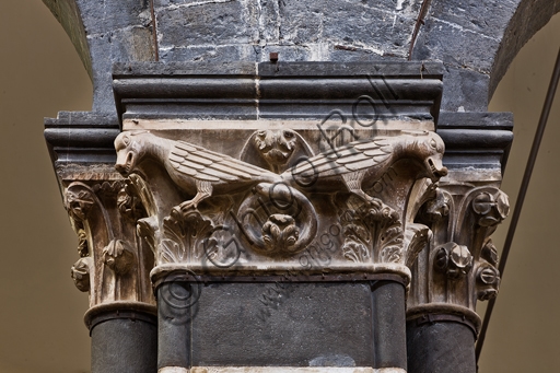 Sculpted capital with dragons with entwined tails, central nave of Genoa Cathedral, Campionese work from 1312