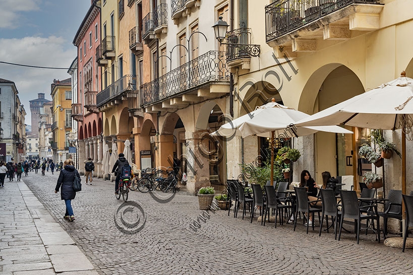 View of Andrea Palladio Avenue in Vicenza Italy with coffee bar tables in historic centre