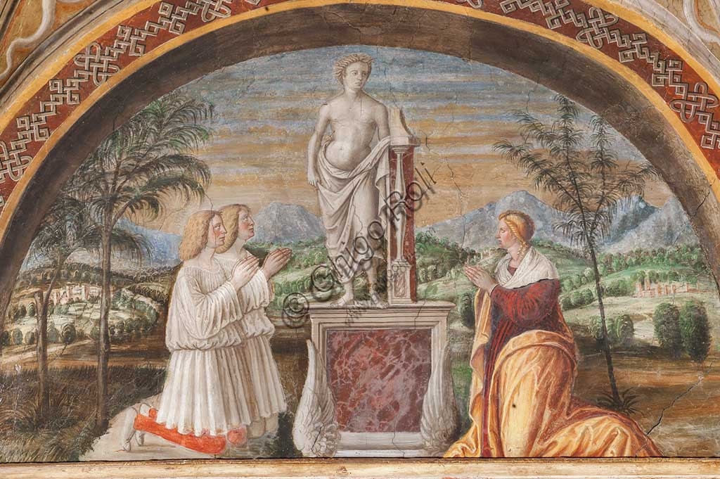 Detail of Alessandro Araldi's frescoes on the vault of the Former Monastery of St. Paul in Parma, depicting grotesques and puttos playing musical instruments.