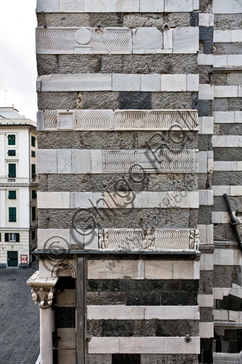Detail of the south side of Genoa Cathedral (St. Lawrence) showing the fronts of ancient Roman sarcophagi embedded in the wall