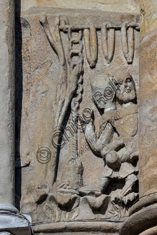 Sculptural detail of the January month panel, school of Benedetto Antelami, Fidenza Cathedral (Parma, Italy)