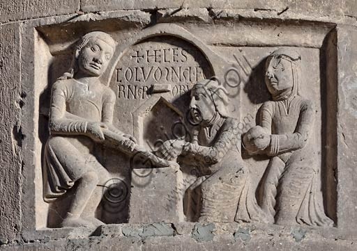 Detail of sculpted Arts and Trades Guild tile on the southern transept pillar of Piacenza Cathedral
