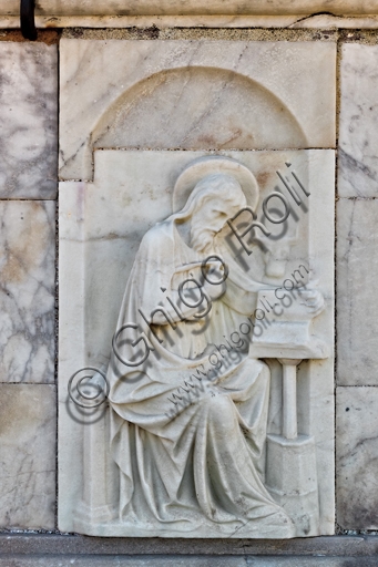 Marble panel depicting Saint Luke, dome tambour St. Lawrence Cathedral Genoa