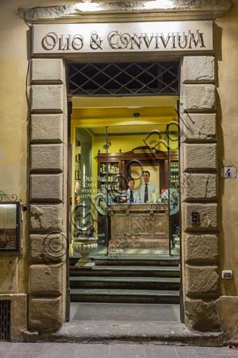 Architectural entrance of the Olio & Convivium restaurant in the historic center of Florence