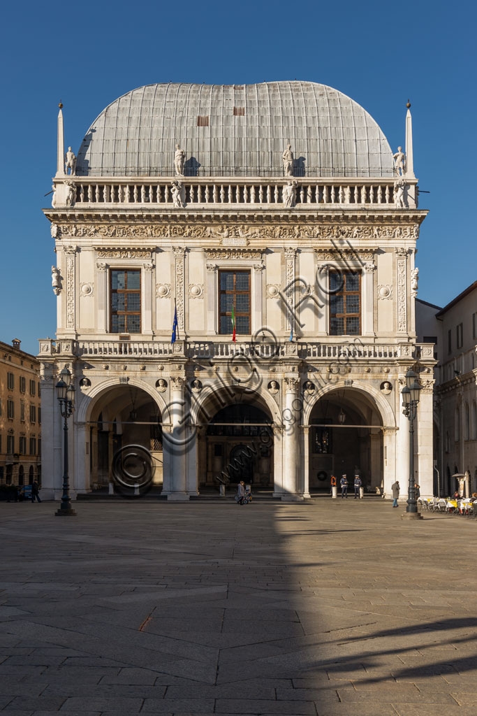 View of Palazzo della Loggia in Piazza della Loggia, Brescia, featuring Renaissance architecture and the roof designed by Luigi Vanvitelli