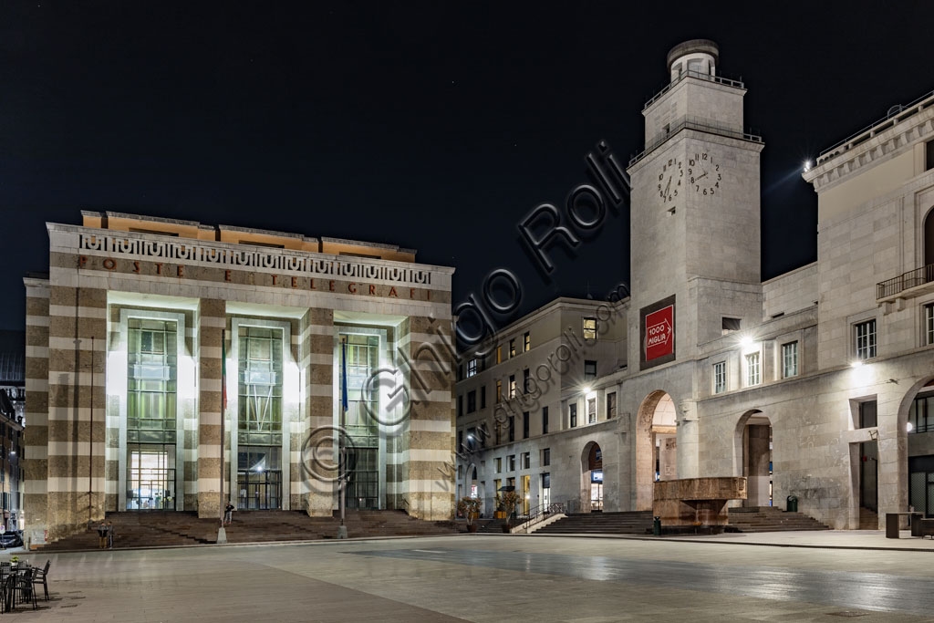 Veduta notturna di Piazza della Vittoria a Brescia con Palazzo delle Poste e Torre della Rivoluzione, architettura di Marcello Piacentini