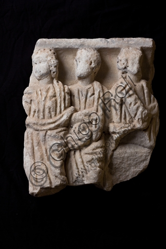 Ancient Roman stone relief sculpture showing figures wearing togas, Museum of Ligurian Archaeology, Genoa