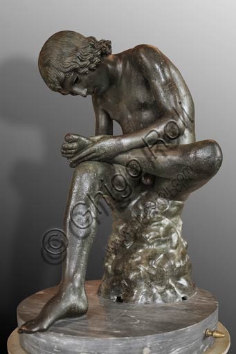 Bronze statue of the Spinario (Boy with a Thorn), Hellenistic sculpture in the Capitoline Museums, Rome