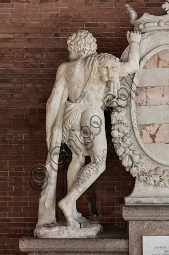 Cremona town coat of arms with Hercules statue in the Loggia dei Militi porch