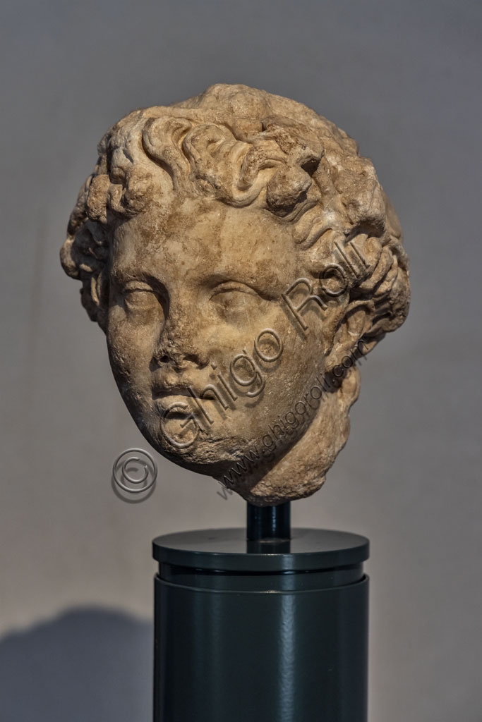 Roman sculpture head of a young boy, Santa Giulia Museum, Brescia, Italy