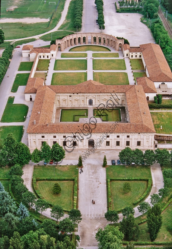Aerial view of Palazzo Te in Mantua, shot from the west, showing the Renaissance architecture and gardens of the Gonzaga's summer residence.