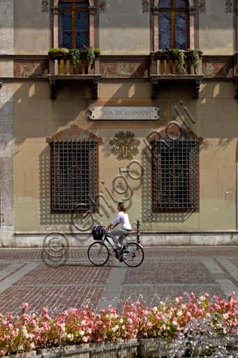 Piazza Rosmini in Rovereto: Urban Scene with Cyclist