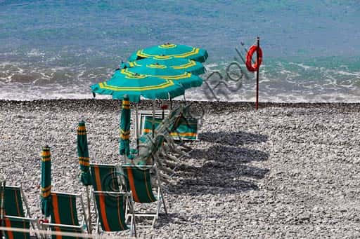 Camogli Beach: Umbrellas and Chairs on the Italian Riviera