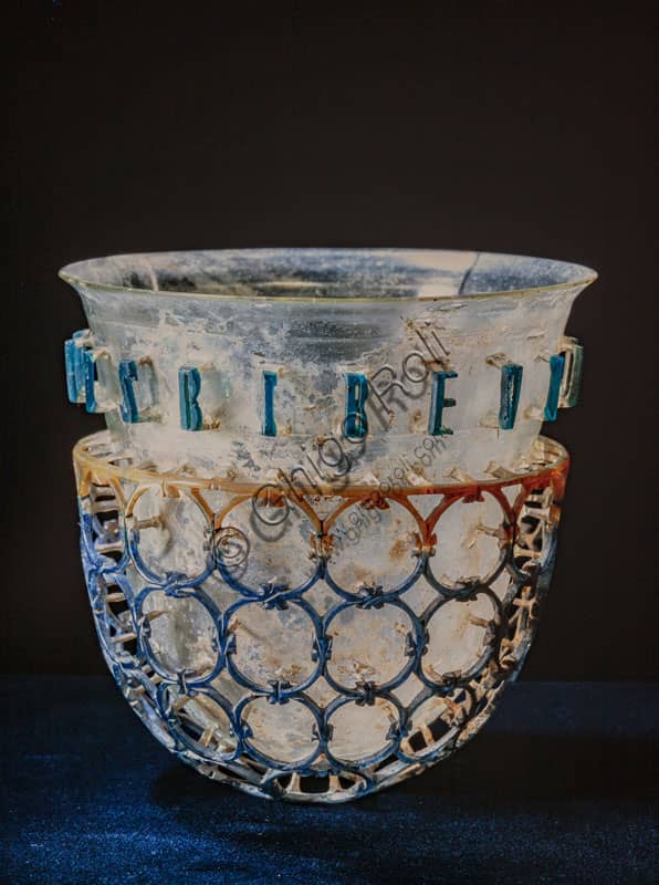 Photograph of the Trivulzio Cup, a 4th century polychrome layered glass diatreta cage cup, Civic Archaeological Museum