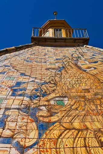 Detail of the polychrome majolica decoration depicting an eagle on the pyramidal roof of the Porta Nuova Tower, Palace of the Normans, Palermo.