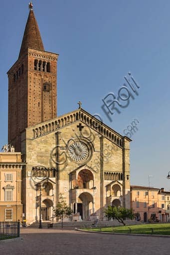 View of the Romanesque facade of Piacenza Cathedral (Duomo) and the adjacent Episcopal Palace