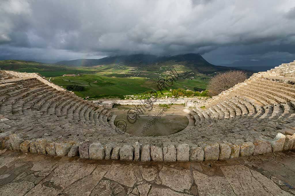 Panoramic view of the ancient Greek theatre at Segesta Archaeological Park, carved into the hillside