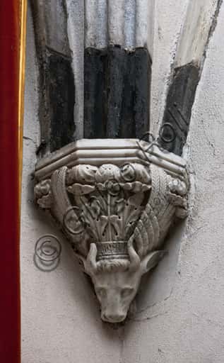 Keystone by Giovanni Gagini with the Symbol of St. Luke in Genoa, 1452