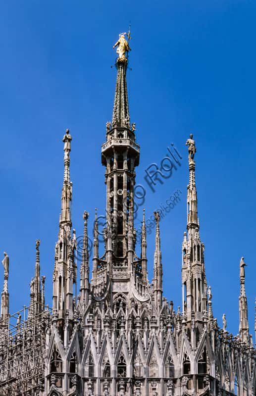 Spires of Milan Cathedral and Madonnina Statue: View from Palace