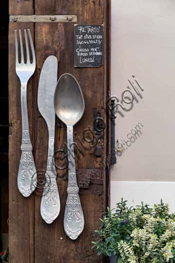 Re Tartù Restaurant Sign in Montefalco with Cutlery Panel