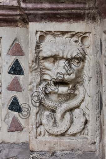 Lion Devouring Serpents: Relief at Genoa's St. Lawrence Cathedral