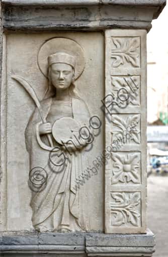 Tomb of Antonio Grimaldi: Pilgrim with Palm and Wheel of Martyrdom