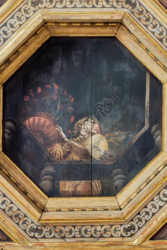 Dettaglio del soffitto a cassettoni di Palazzo Te a Mantova: dipinto su tavola di Agostino da Mozzanica con giovane donna e vaso di garofani su un balcone.