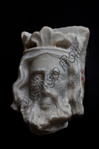 Sculptural fragment of a medieval crowned head, carved stone, Museum of St. Augustine Genoa Italy