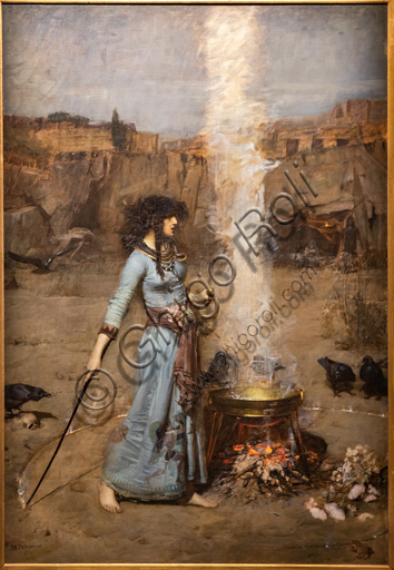 Dettaglio del dipinto 'Il cerchio magico' di John William Waterhouse che mostra una donna che traccia un cerchio di fuoco con un calderone, paesaggio roccioso e corvi.