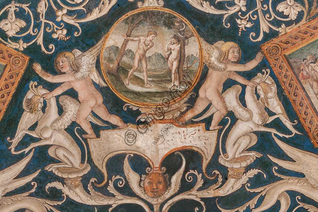 Parma, Ex-Monastero di San Paolo: Camera con affreschi di A. Araldi (1514) . Nella volta, scene dell'Antico e del Nuovo Testamento, decorazioni a grottesche, putti musicanti. Particolare con Adamo ed Eva.