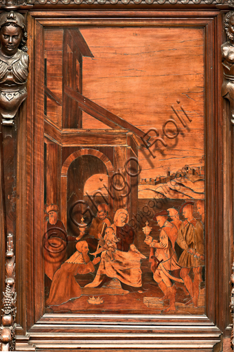 Genova, Duomo (Cattedrale di S. Lorenzo), interno,  presbiterio, abside, coro, lato sud: "Adorazione dei Magi", tarsia lignea di Gian Michele De' Pantaleoni (secolo XVI).