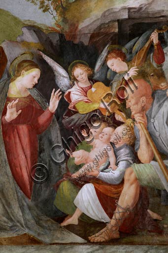   Vercelli, Church of St. Christopher, Chapel of the blessed Virgin or of the Assunta: "Adoration of the Shepherds with Musician Angels".  Fresco by Gaudenzio Ferrari, 1529 - 1534.