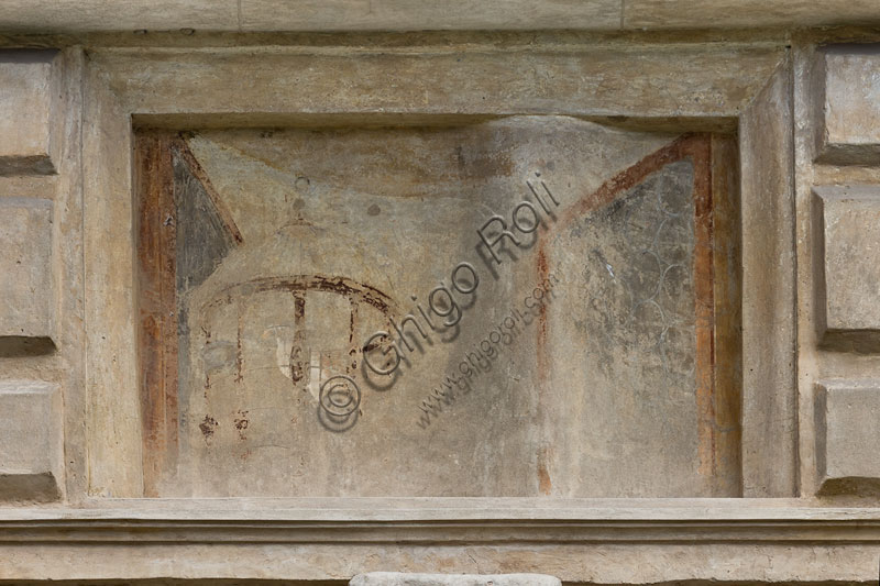 Mantua, Palazzo Te (Gonzaga's Summer residence), Cortile d'Onore (the Courtyard of Honour): detail of a tromp l'oeil fresco on the Northern side which represents a fake window and a bird cage.