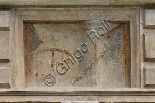 Mantua, Palazzo Te (Gonzaga's Summer residence), Cortile d'Onore (the Courtyard of Honour): detail of a tromp l'oeil fresco on the Northern side which represents a fake window and a bird cage.