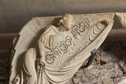 , Genova, the Diocesan Museum: the funeral monument of Cardinal Luca Fieschi, by the worskhop of Giovanni di Balduccio from Pisa, about 1336.Detail of an angel.