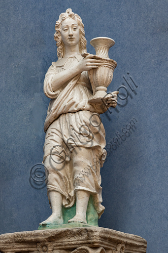  "Candelabra holder angel", in the manner of Antonio Rossellino, glazed terracotta, early 16th century.