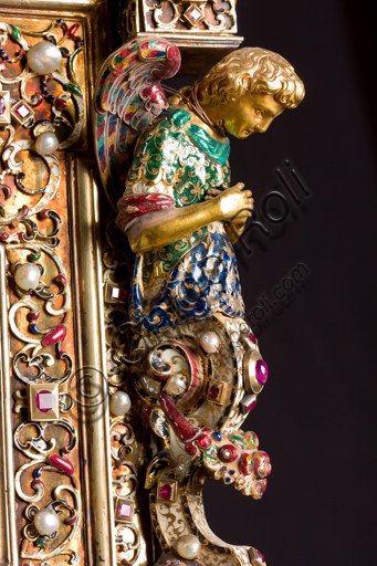   Genoa, Museum of the Treasury of the Cathedral of San Lorenzo: Cabinet of the ashes of St. John the Baptist. Florentine manufacture; XVI-XVII century; silver gilt, enamel, pearls, semi-precious stones. Detail of an angel.It was probably a jewelry box, that belonged to the Pinceti family who sold it to the Cathedral.