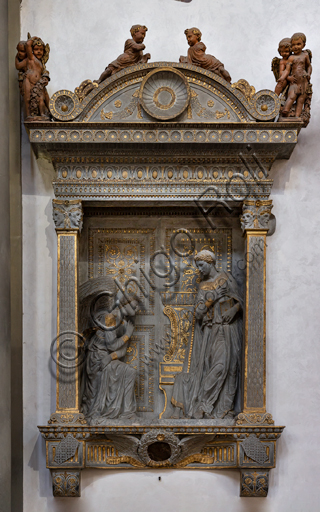 Basilica of the Holy Cross, right aisle: tabernacle with "the Cavalcanti Annunciation", by Donatello, 1433-5, carved in sandstone.