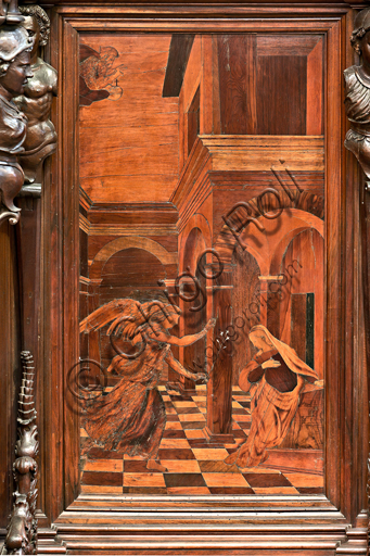 , Genoa, Duomo (St. Lawrence Cathedral), inside,  presbitery, apse, choir, South side: "Annunciation", wood intarsia by  Gian Michele De' Pantaleoni (XVI century).