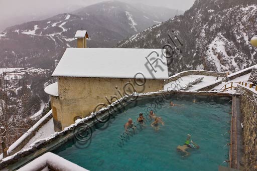  Bormio, Spa,  the thermal baths "Bagni Vecchi": guests in the open air pool.