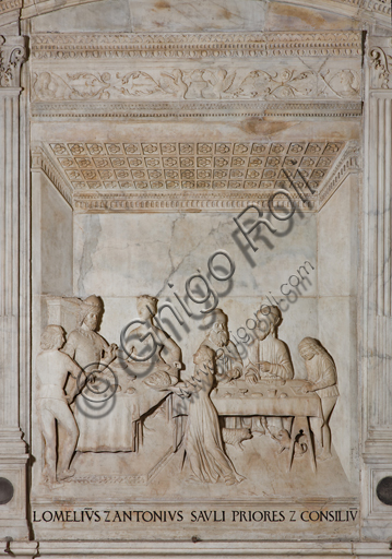 Genoa, Duomo (St. Lawrence Cathedral),the Chapel of St. John the Baptist, Western wall:  "King Herod's Feast", detail of  the lunette with scenes of the life of St. John the Baptist; bas-relief (stiacciato) in marble. The lunette was realised  by Giovanni d’Aria with the collaboration of the brothers Michele and Bonino in 1496.