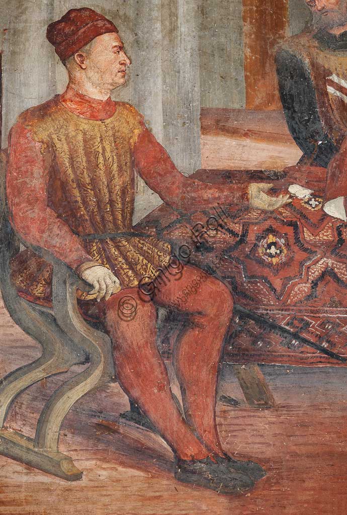 Cavernago, Malpaga Castle or Colleoni Castle, Hall of Honour: cycle of frescoes depicting the visit of Christian I of Denmark to Bartolomeo Colleoni, by Marcello Fogolino, (some historians attribute these frescoes to Romanino), 1474. Detail with Bartolomeo Colleoni sitting.