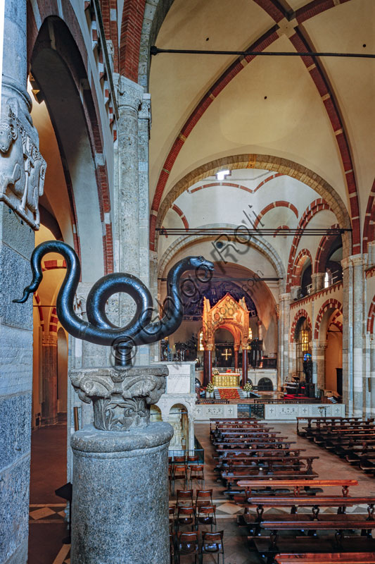  Basilica of St. Ambrose: view of the nave.I n the foreground a bronze snake, a Byzantine artwork of the century IX which was given to St. Ambrose  as a gift from the Eastern. Emperor 