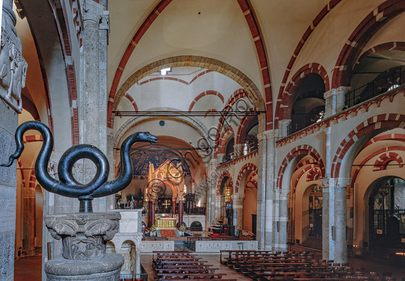   Basilica of St. Ambrose: view of the nave.I n the foreground a bronze snake, a Byzantine artwork of the century IX which was given to St. Ambrose  as a gift from the Eastern. Emperor 