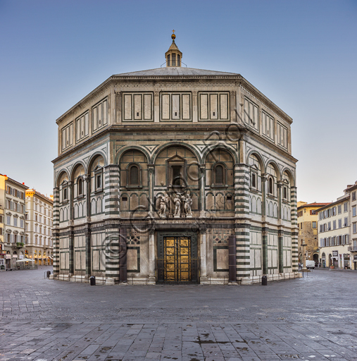 Florence, the Baptistery of St. John, exterior: the South  façade in Carrara white marble and green Prato marble with the Paradise door by Lorenzo Ghiberti and "The Baptism of Christ" (copy of the original statues in the Opa Museum) by Andrea Sansovino, (1467-1529), Vincenzo Danti (1530-1576) and Giuseppe Spinazzi (1726-1798).