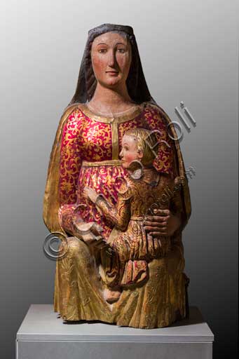 Bergamo, Bernareggi Museum; Madonna with Infant Jesus, statue in carved, painted and golden wood, XIV century, by Lombardy sculptor.