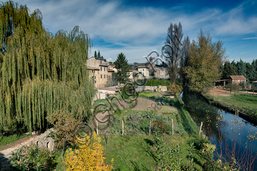 Bevagna: partial view of the town with its walss and the kitchen garden by the river Topino.