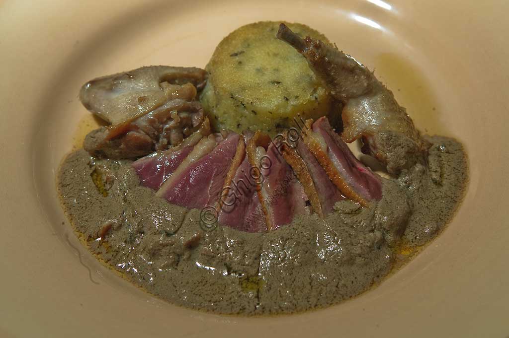 Bevagna, the "Bottega Di Piazza Onofri", wine shop and restaurant: a dish of duck with a truffle sauce.